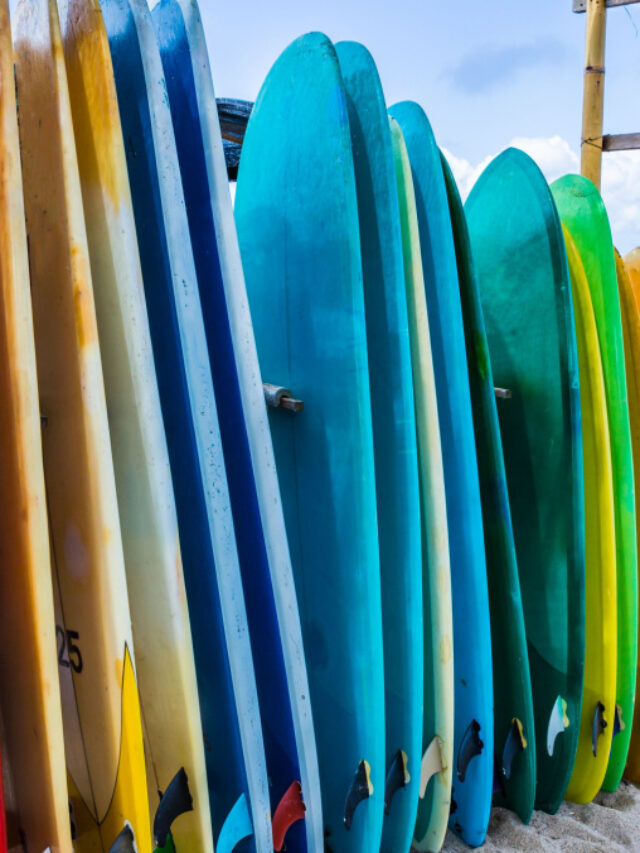 Bali / Indonesia - May 22, 2019: Colorful surfboards on the beach.