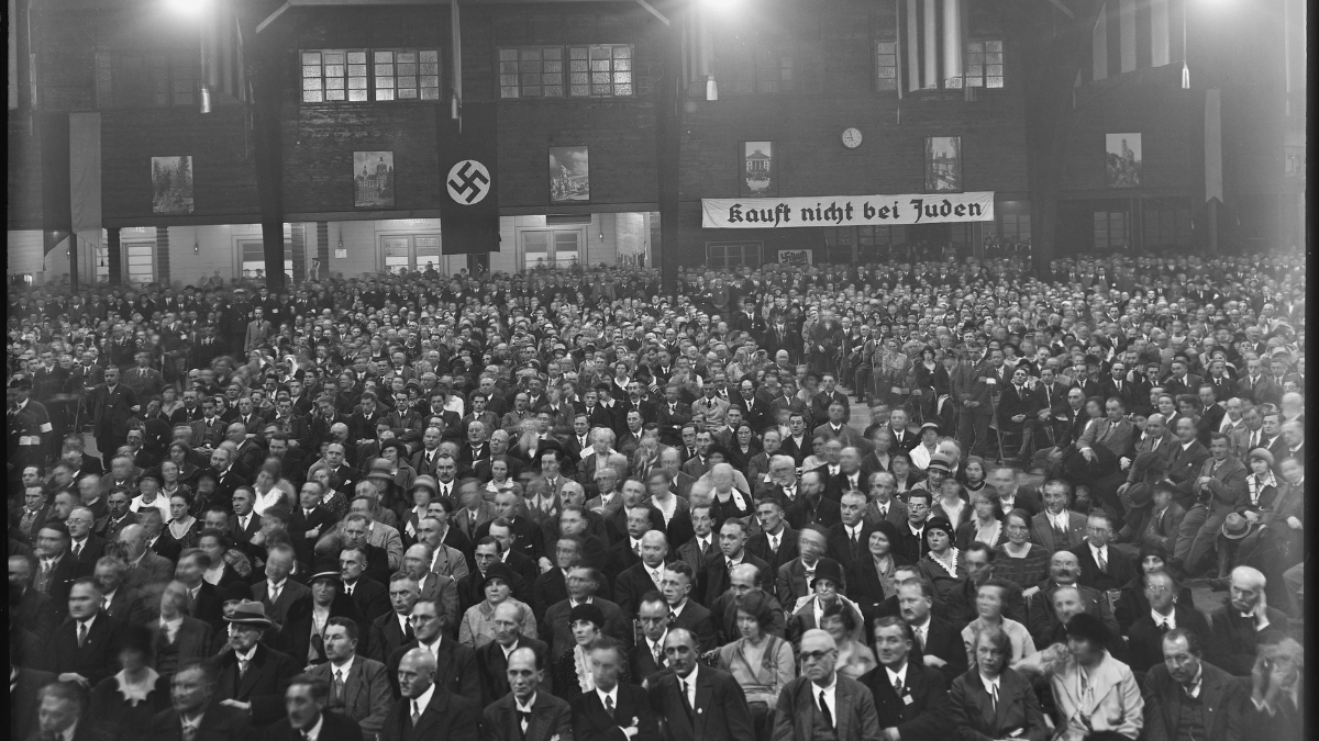 Nazi Party political rally. Sign in the back reads, "Don't buy from Jews."
